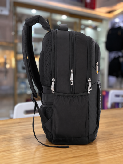 American Tourister black laptop backpack side profile